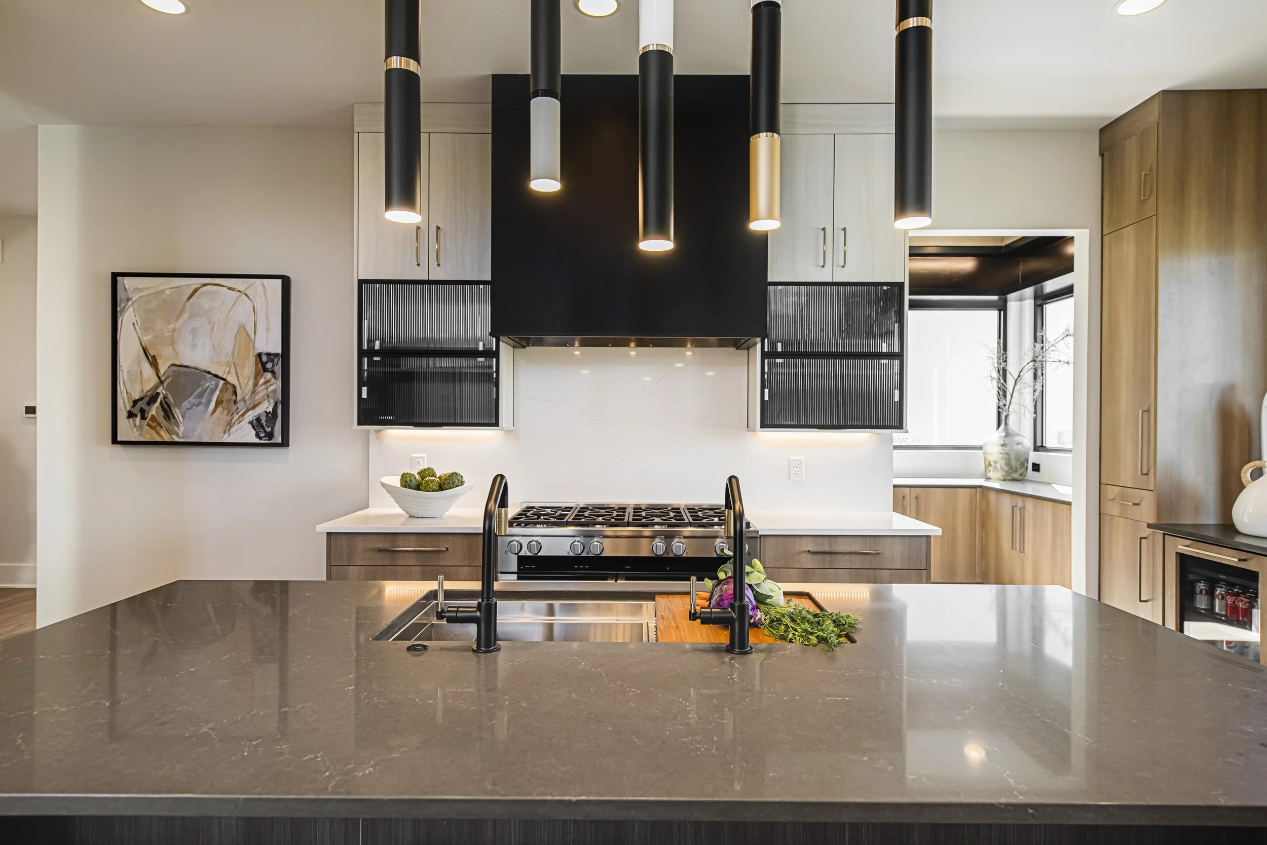 Westfield luxury kitchen with natural timber and pale stone surfaces